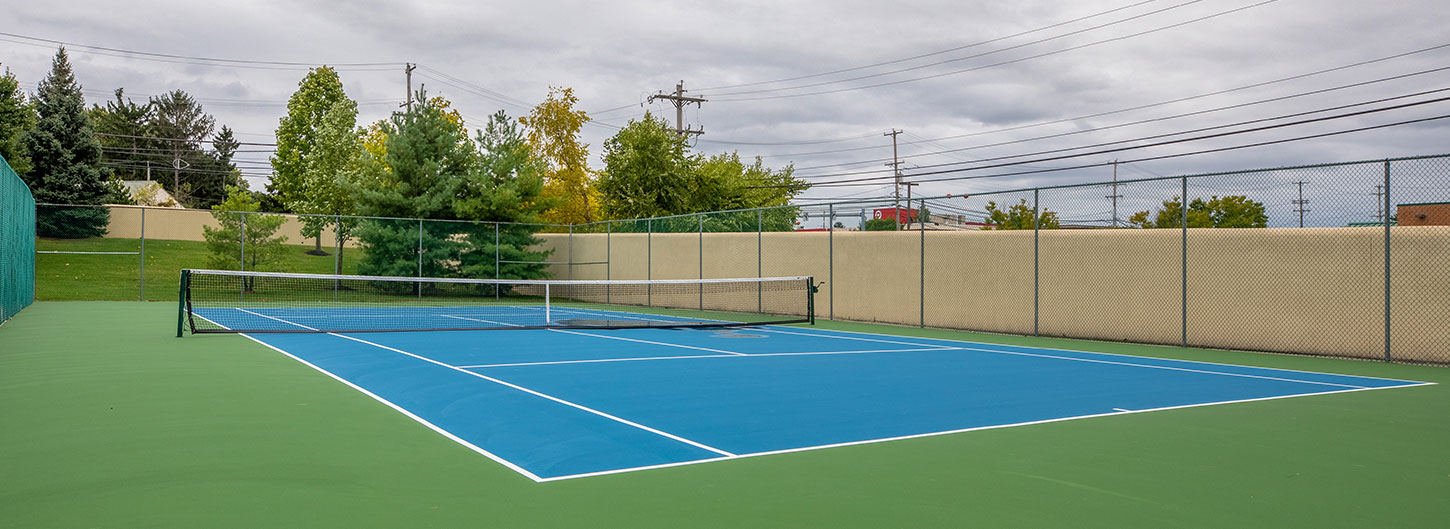 Newly refurbished tennis court at Henderson Square